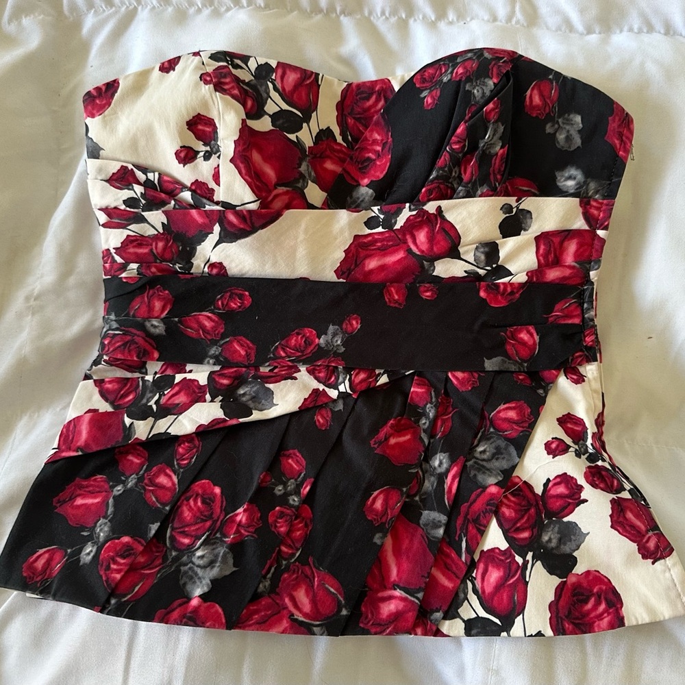 Beautiful WHBM corset in rose red, black and white floral pattern.